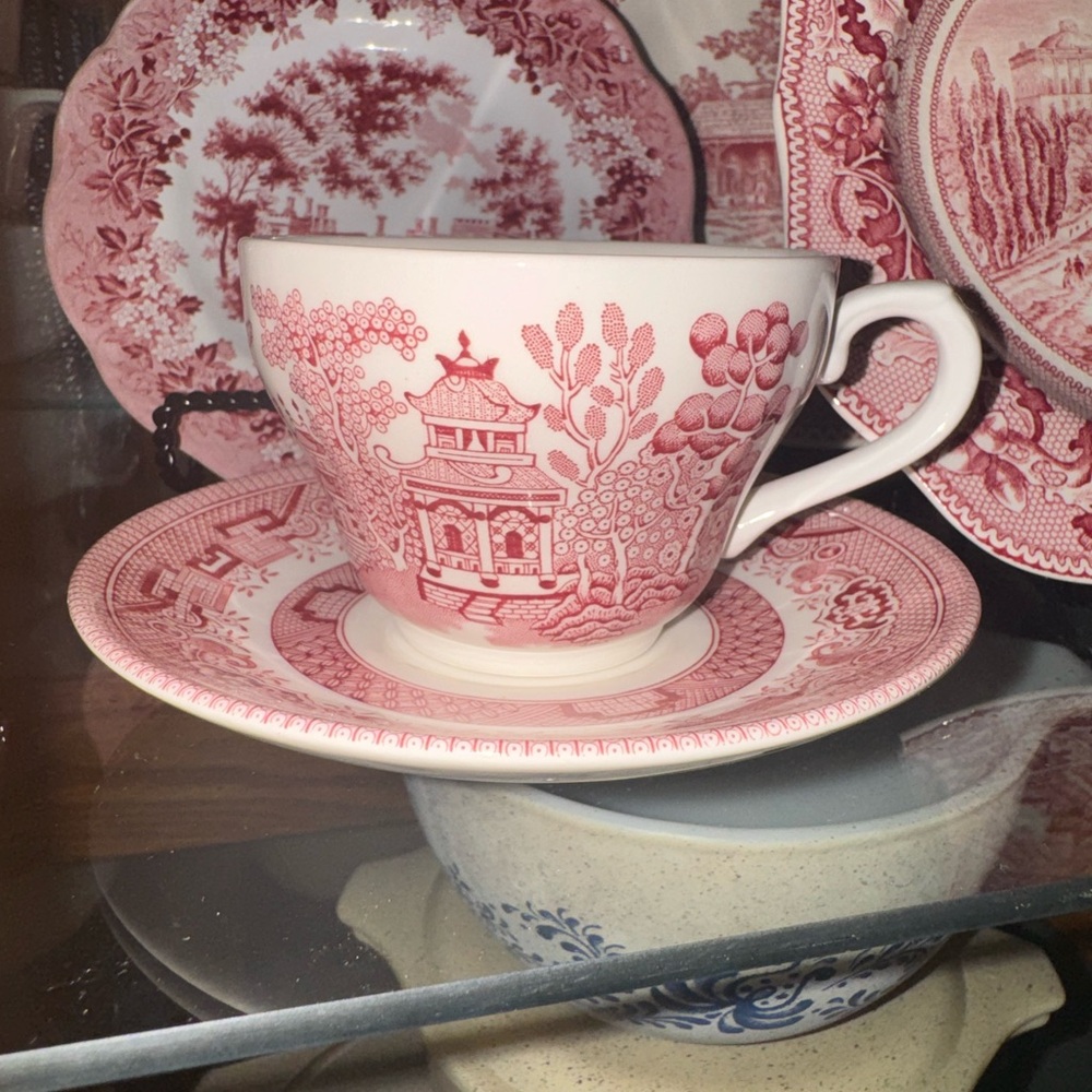 Elegant Red and White Teacup and Saucer Set